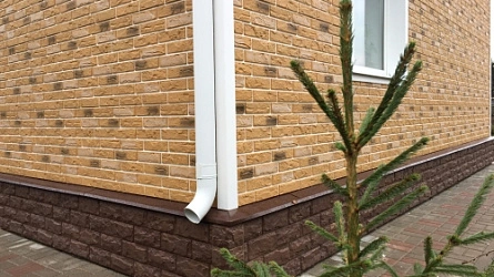 Кирпич или фасадные панели под кирпич?